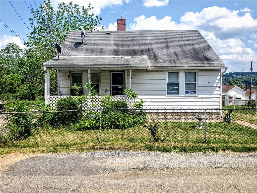 308 Linton Street McKees Rocks, PA 15136 - Photo 1 of 10 a view of a house with a garden