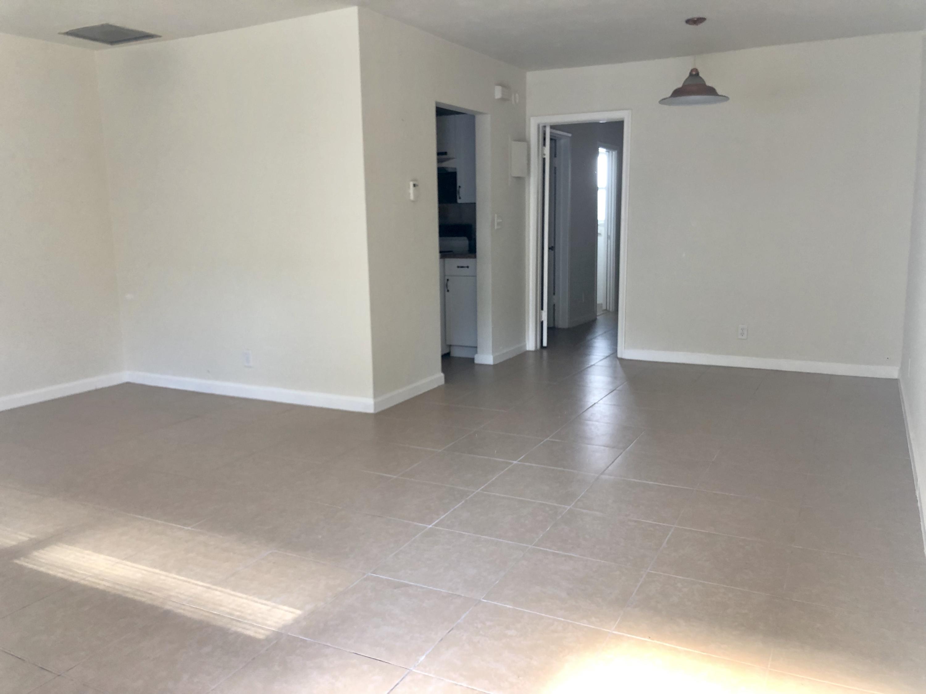 2015 Southeast 5th Street, Unit 2 Deerfield Beach, FL 33441 - Photo 4 of 12 Living / Dining Room