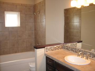 8970 Coolidge Road, Unit 6 Yakima, WA 98903 - Photo 14 of 15 a bathroom with a sink and a mirror
