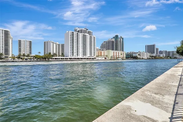 a view of lake with patio