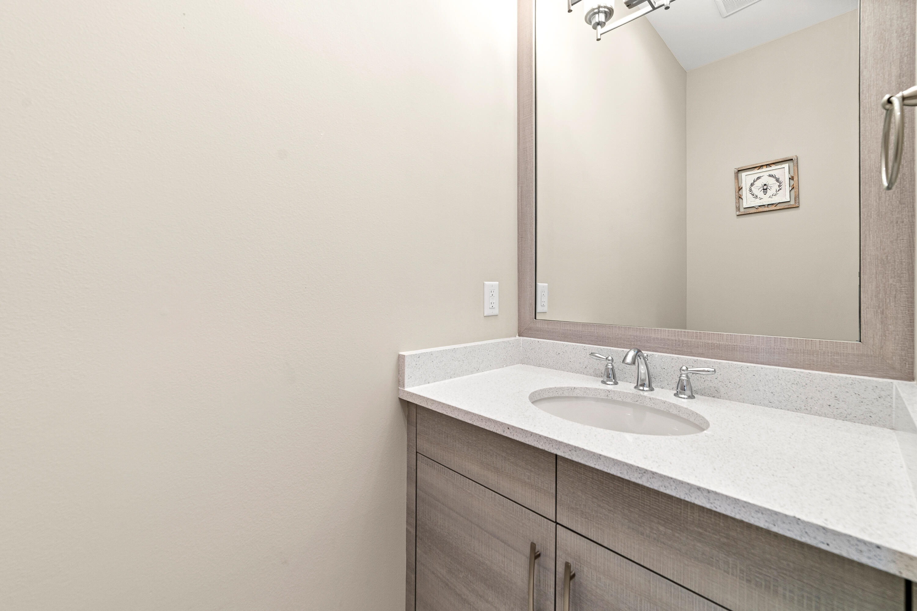15380 Blue River Road Delray Beach, FL 33446 - Photo 20 of 31 a bathroom with a sink and a mirror