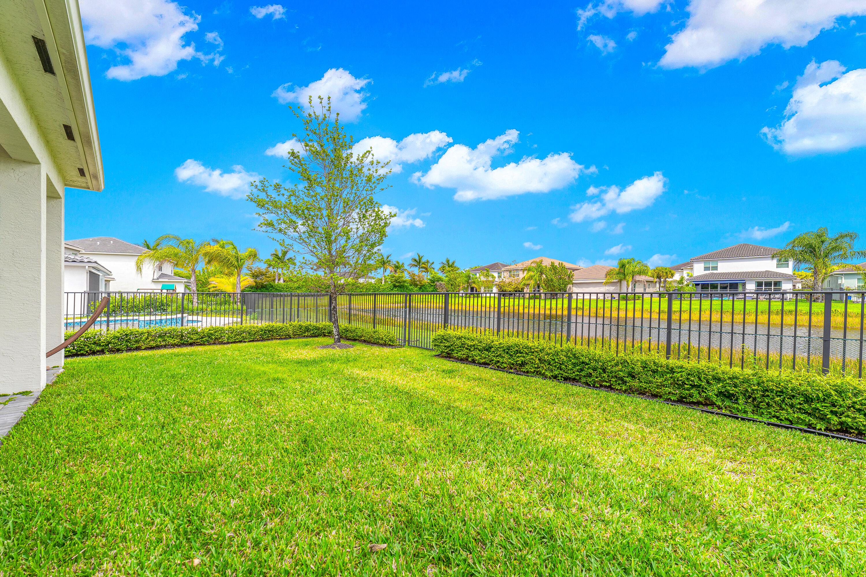 15380 Blue River Road Delray Beach, FL 33446 - Photo 26 of 31 a view of a garden