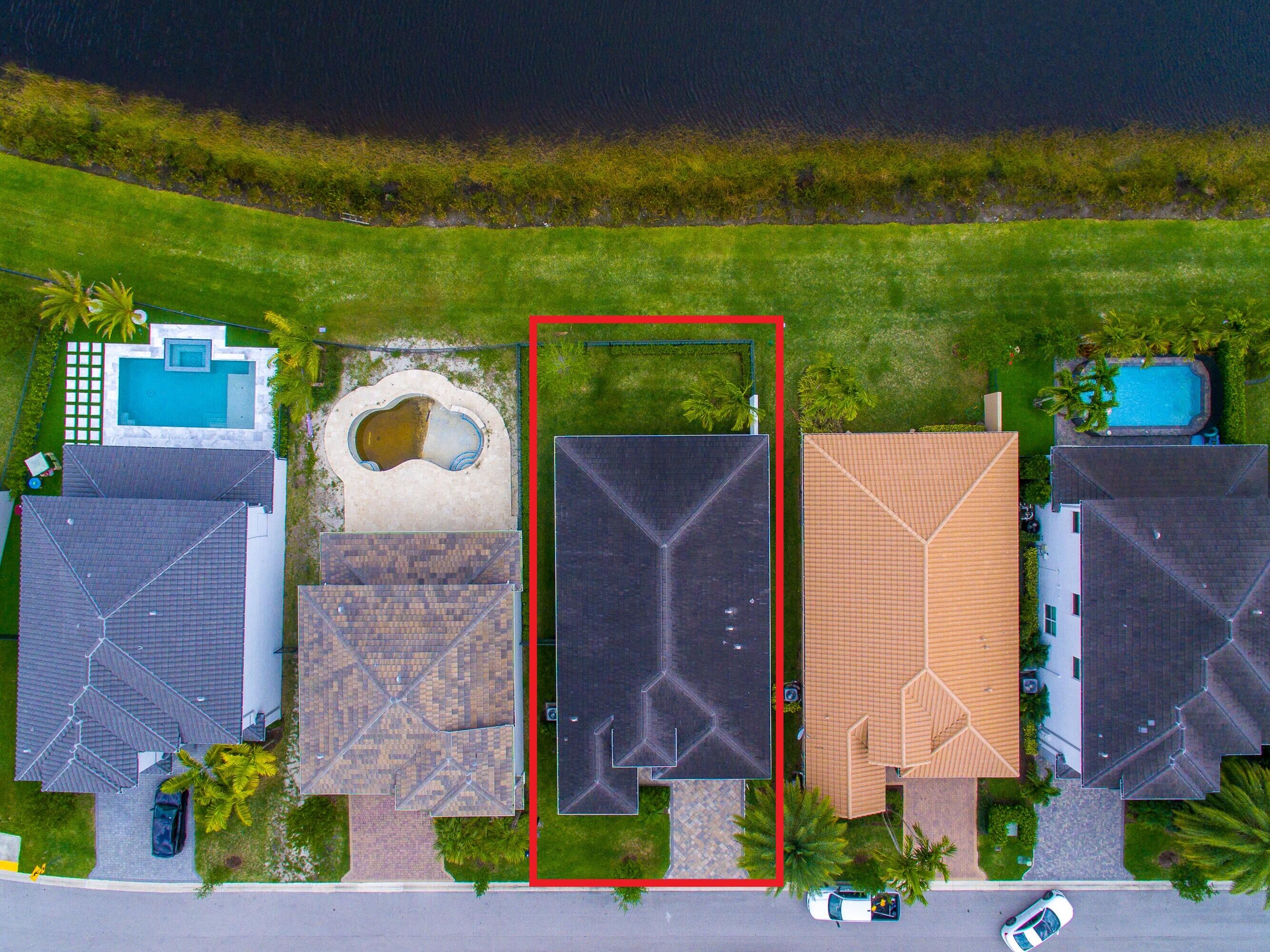 15380 Blue River Road Delray Beach, FL 33446 - Photo 27 of 31 an aerial view of house with yard swimming pool and outdoor seating