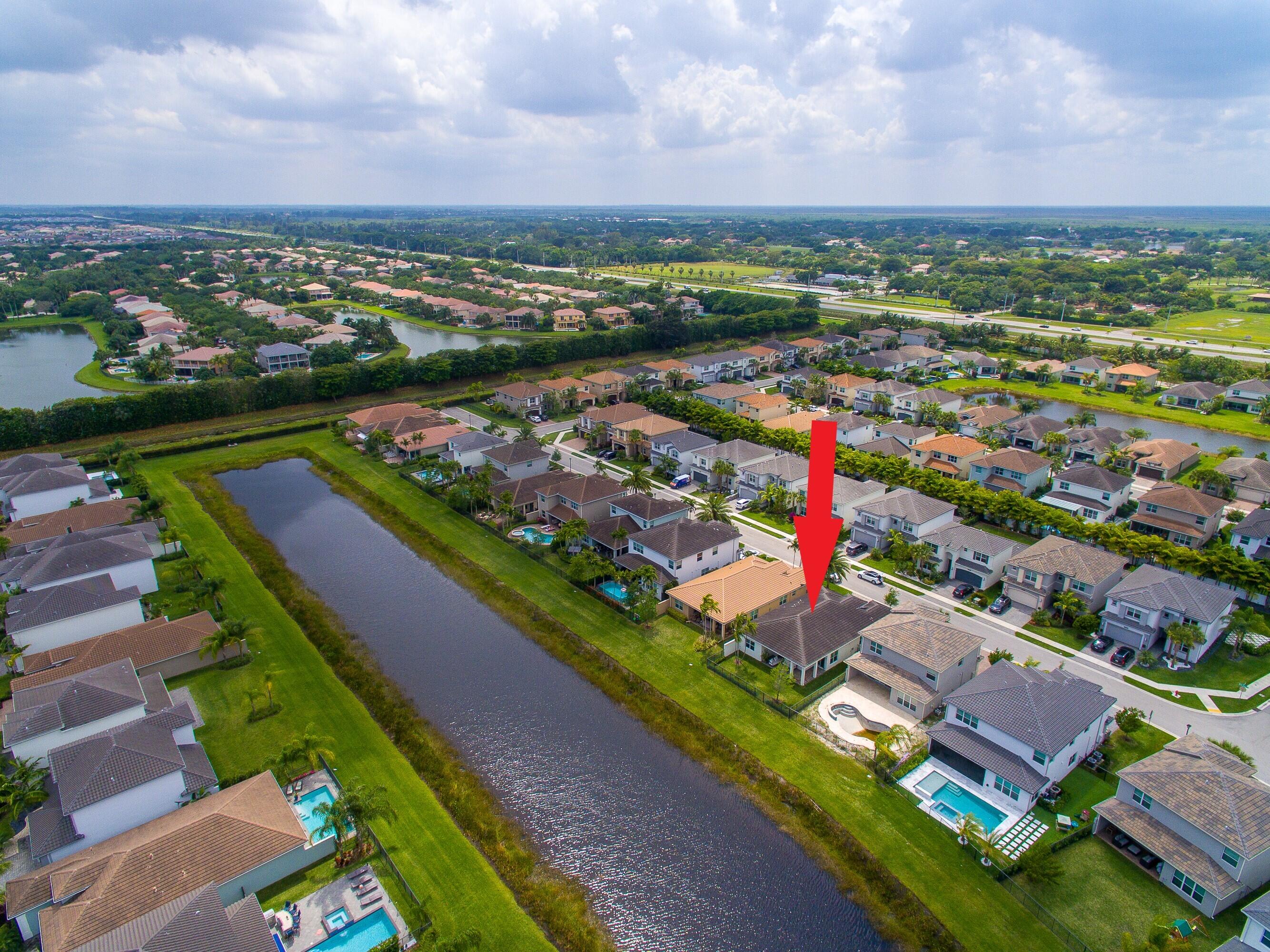 15380 Blue River Road Delray Beach, FL 33446 - Photo 30 of 31 an aerial view of residential houses with outdoor space