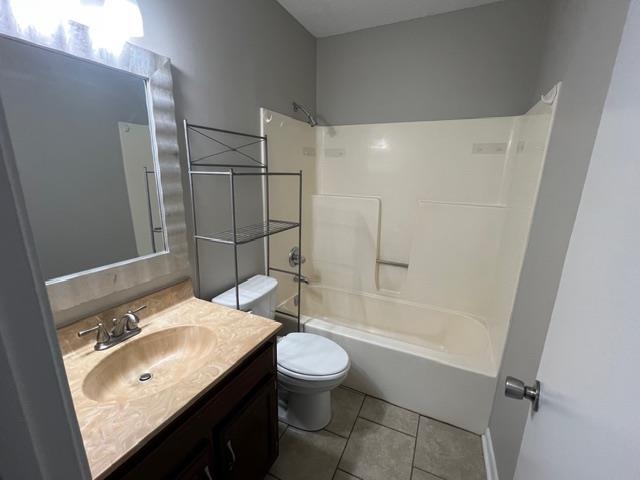 2541 Ray Bluff Road Millington, TN 38053 - Photo 10 of 12 Full bathroom with vanity, shower / bath combination, and tile patterned floors
