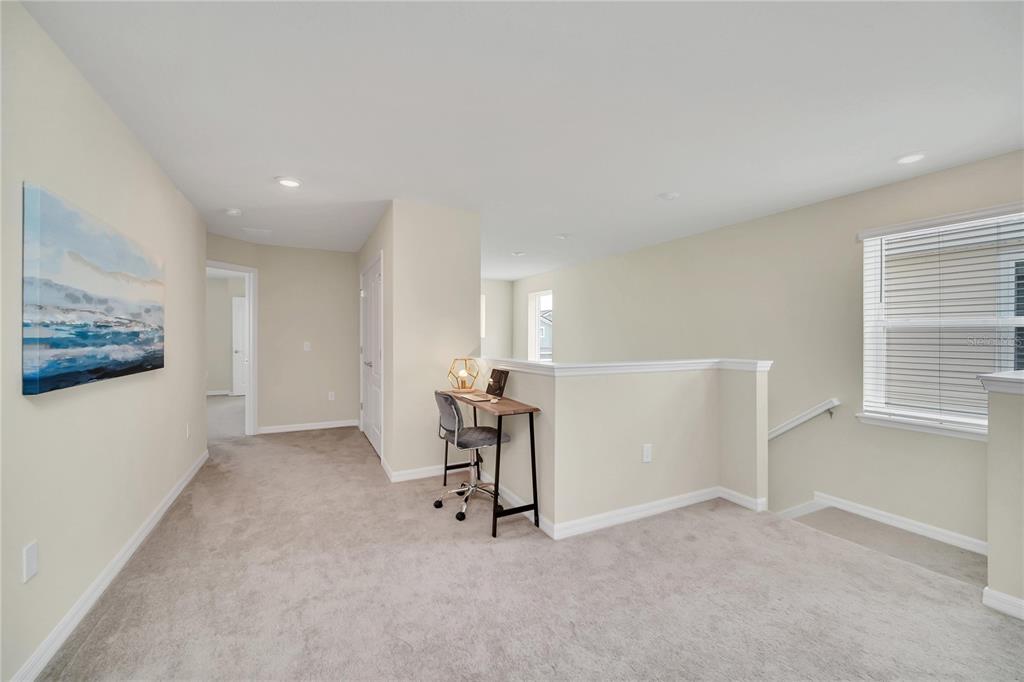 7196 Oakmoss Loop Davenport, FL 33837 - Photo 36 of 48 a view of an empty room with a window