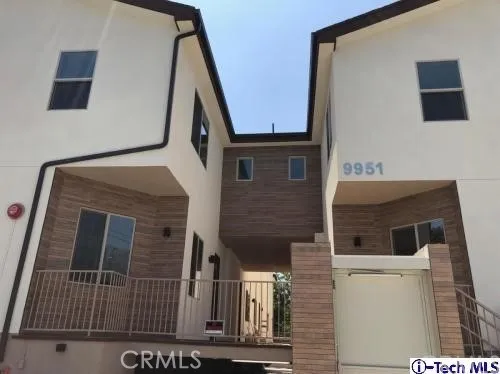 a front view of a house with balcony