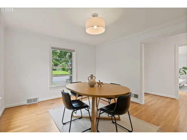 a table and chairs in a room