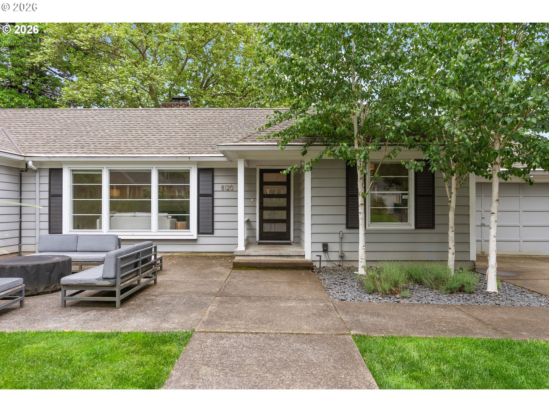 8120 Southwest Maple Drive Portland, OR 97225 - Photo 2 of 48 a house view with a outdoor space