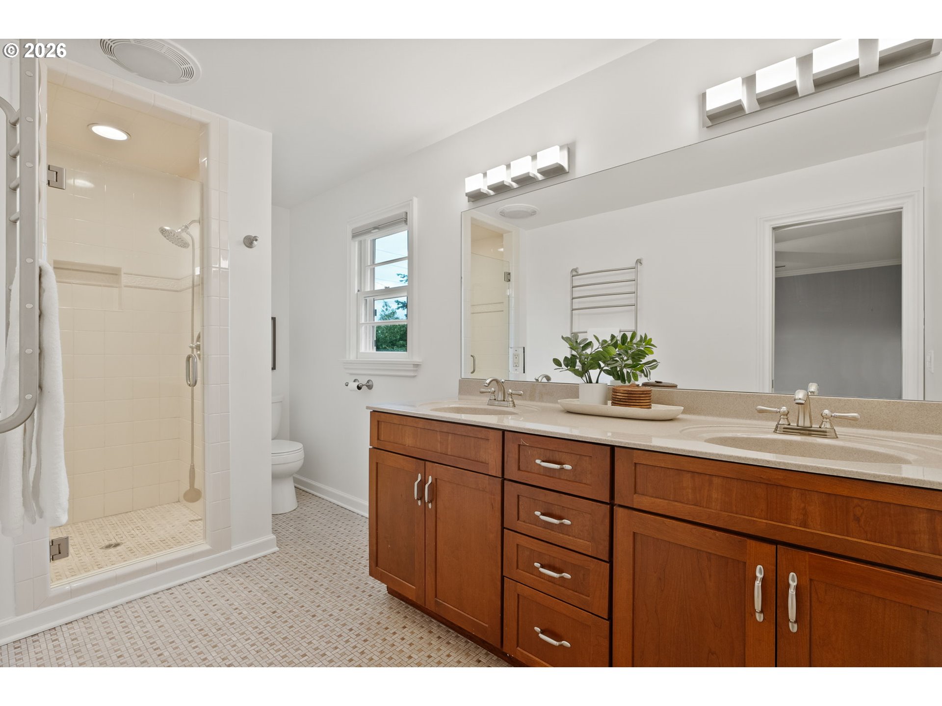 8120 Southwest Maple Drive Portland, OR 97225 - Photo 24 of 48 a bathroom with a granite countertop sink mirror and shower