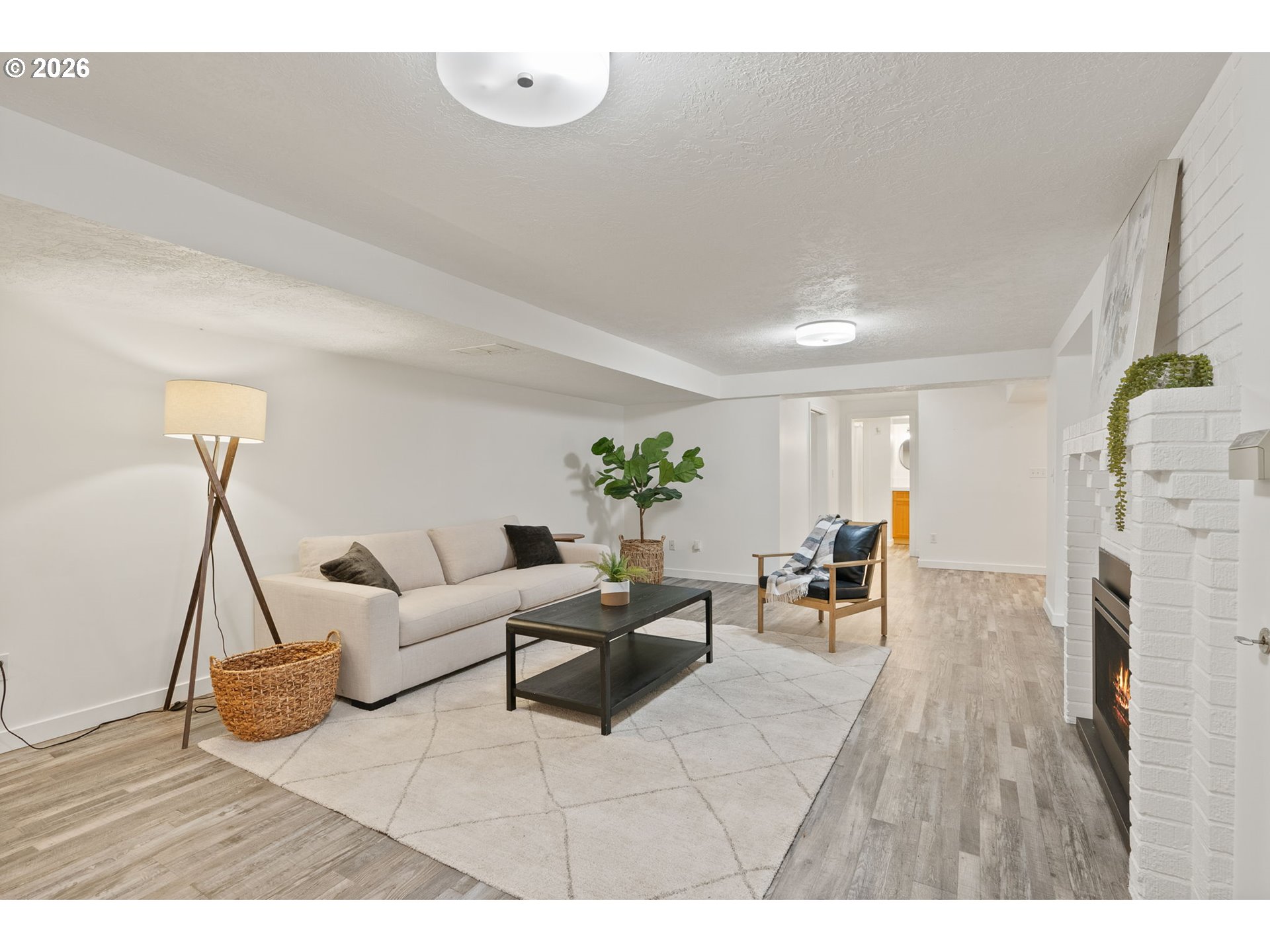 8120 Southwest Maple Drive Portland, OR 97225 - Photo 29 of 48 a living room with furniture and a fireplace