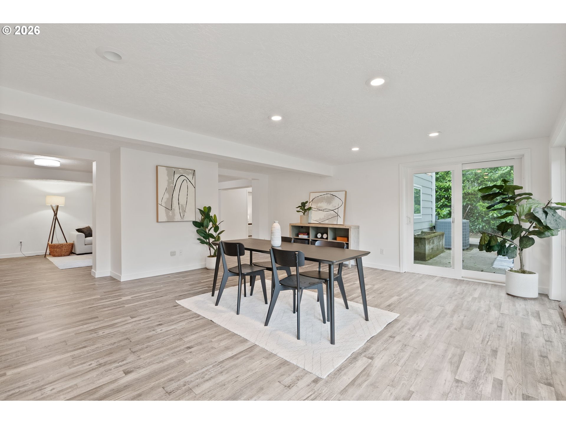 8120 Southwest Maple Drive Portland, OR 97225 - Photo 32 of 48 a view of a dining room with furniture and wooden floor