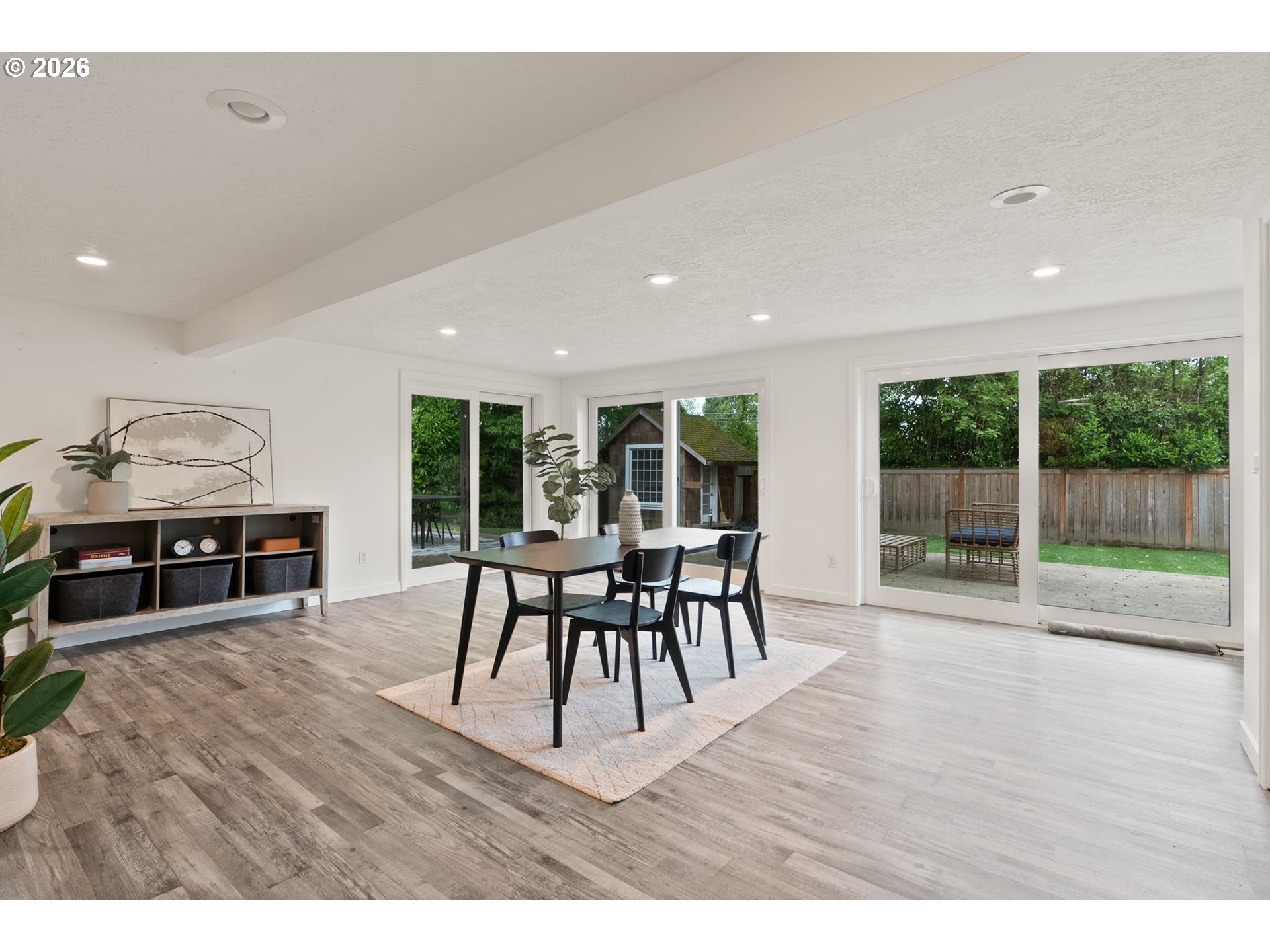 8120 Southwest Maple Drive Portland, OR 97225 - Photo 33 of 48 a dining room with furniture and a floor to ceiling window
