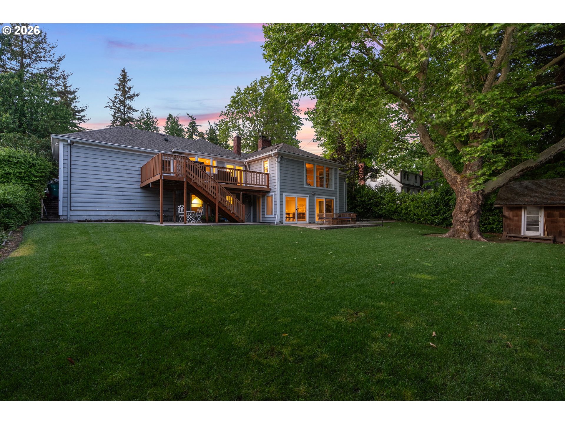 8120 Southwest Maple Drive Portland, OR 97225 - Photo 43 of 48 a front view of a house with garden