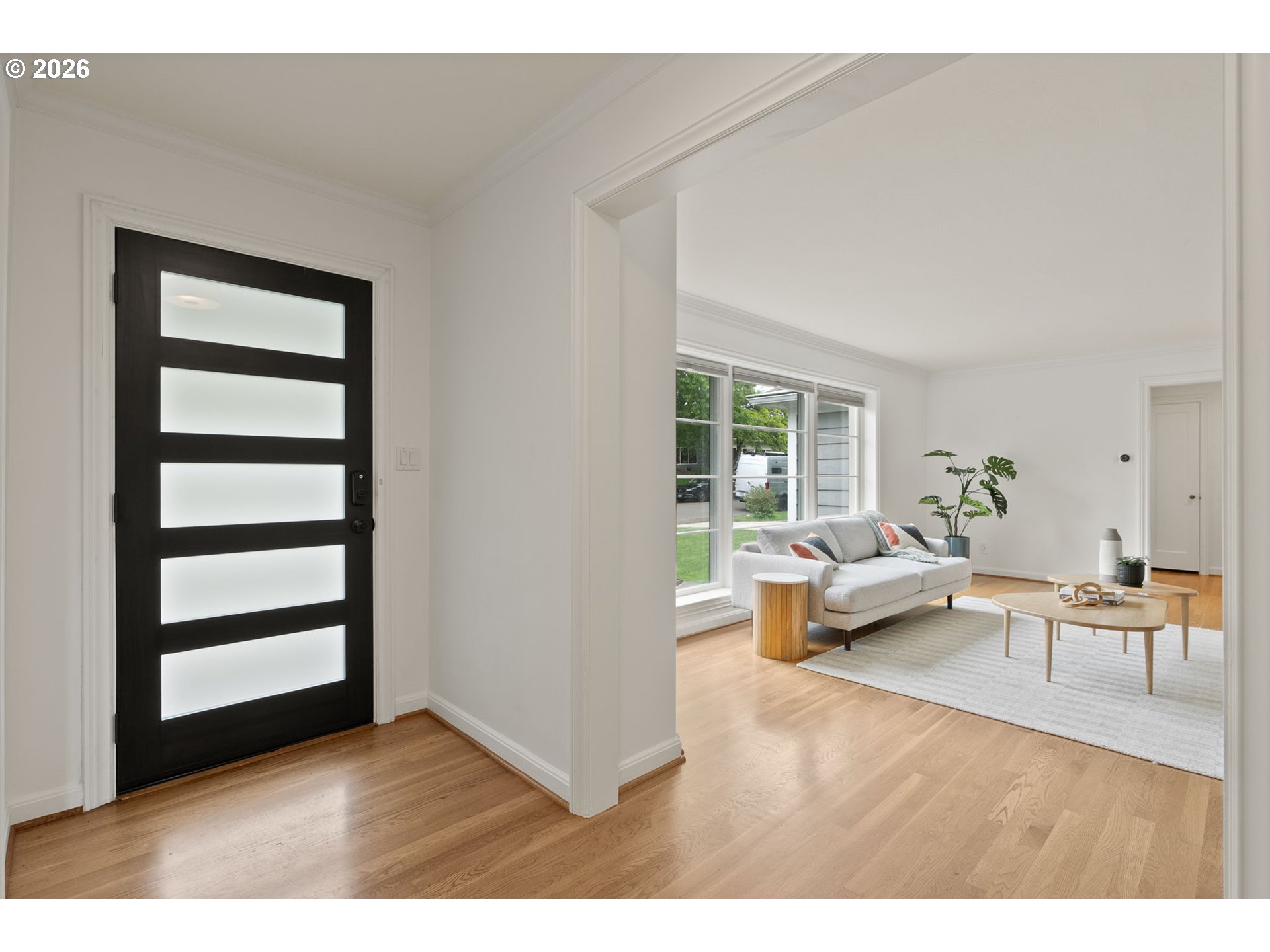 8120 Southwest Maple Drive Portland, OR 97225 - Photo 6 of 48 a living room with furniture and a window