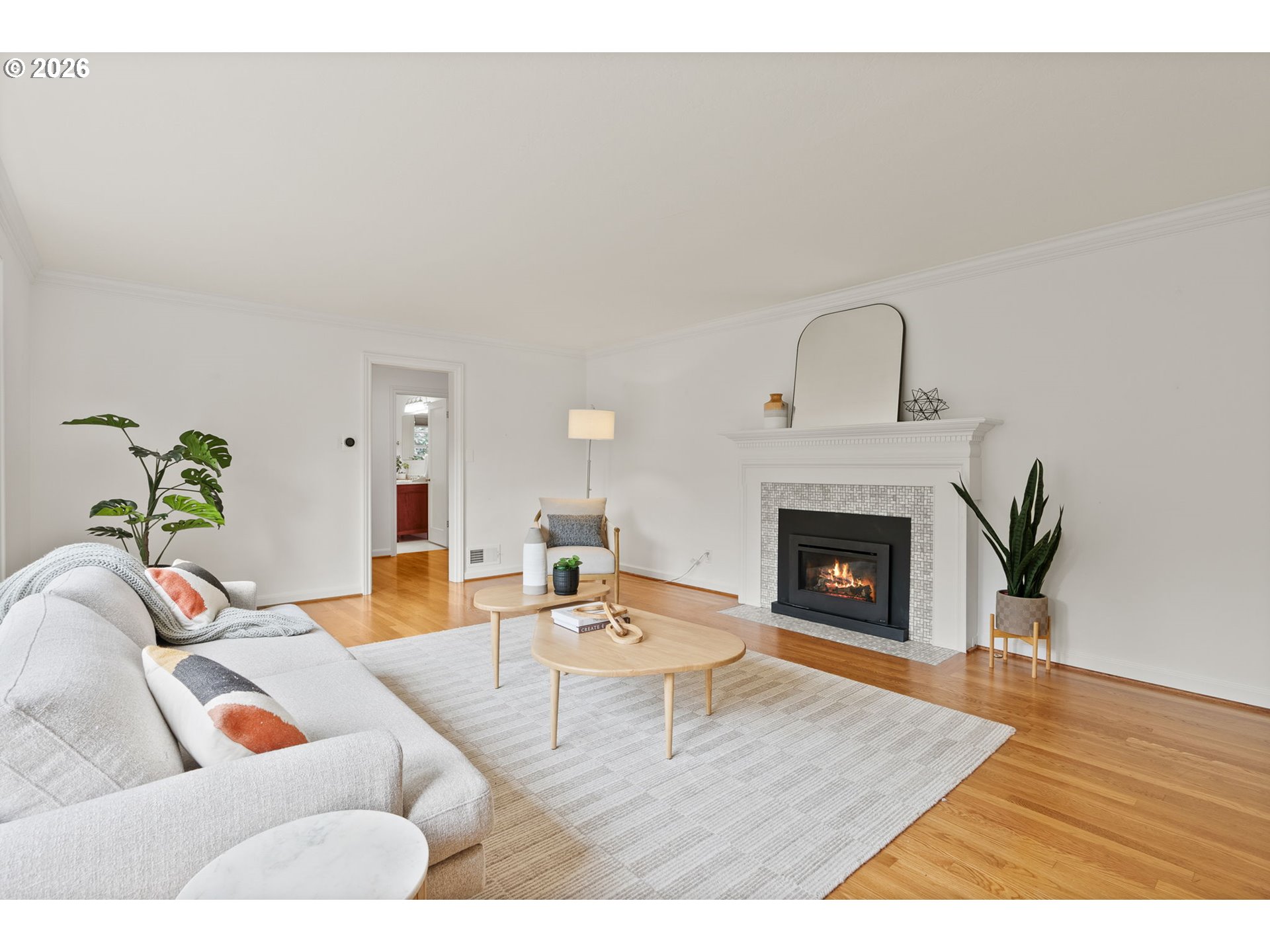 8120 Southwest Maple Drive Portland, OR 97225 - Photo 7 of 48 a living room with furniture and a fireplace