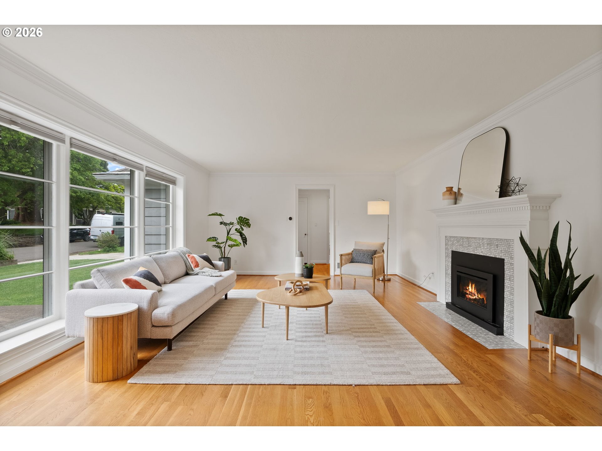 8120 Southwest Maple Drive Portland, OR 97225 - Photo 8 of 48 a living room with furniture and a fireplace