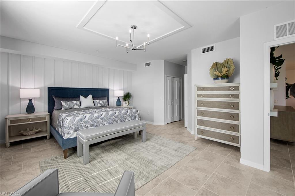6008 Ellerston Way Avenue, Unit 1011 Immokalee, FL 34142 - Photo 24 of 50 Bedroom with a chandelier and light tile patterned floors
