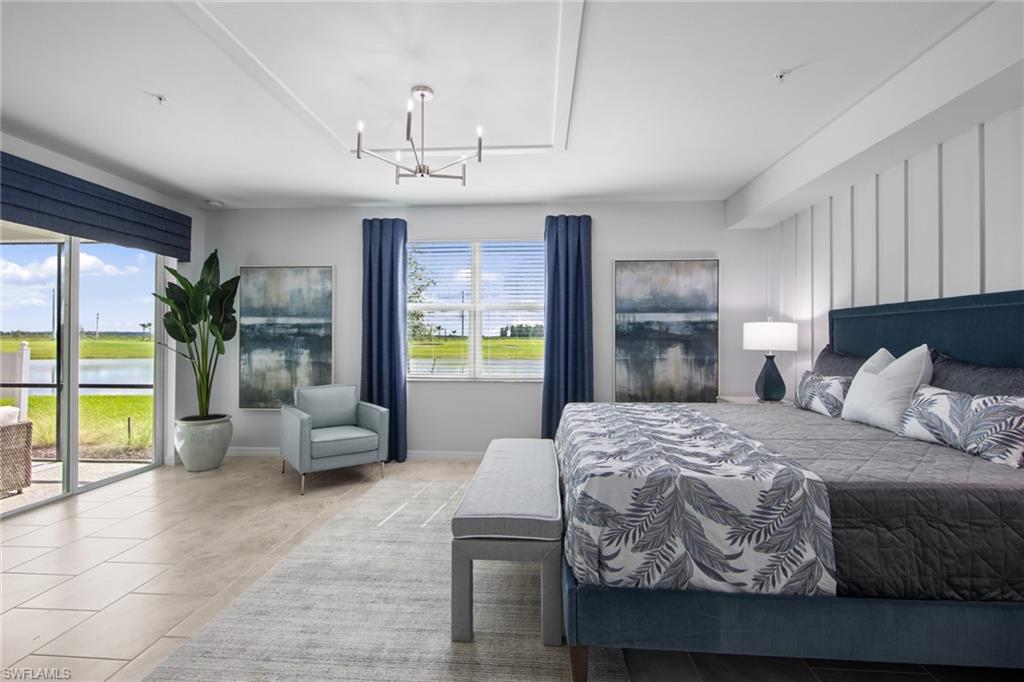 6008 Ellerston Way Avenue, Unit 1011 Immokalee, FL 34142 - Photo 25 of 50 Tiled bedroom with a chandelier, access to outside, and a water view