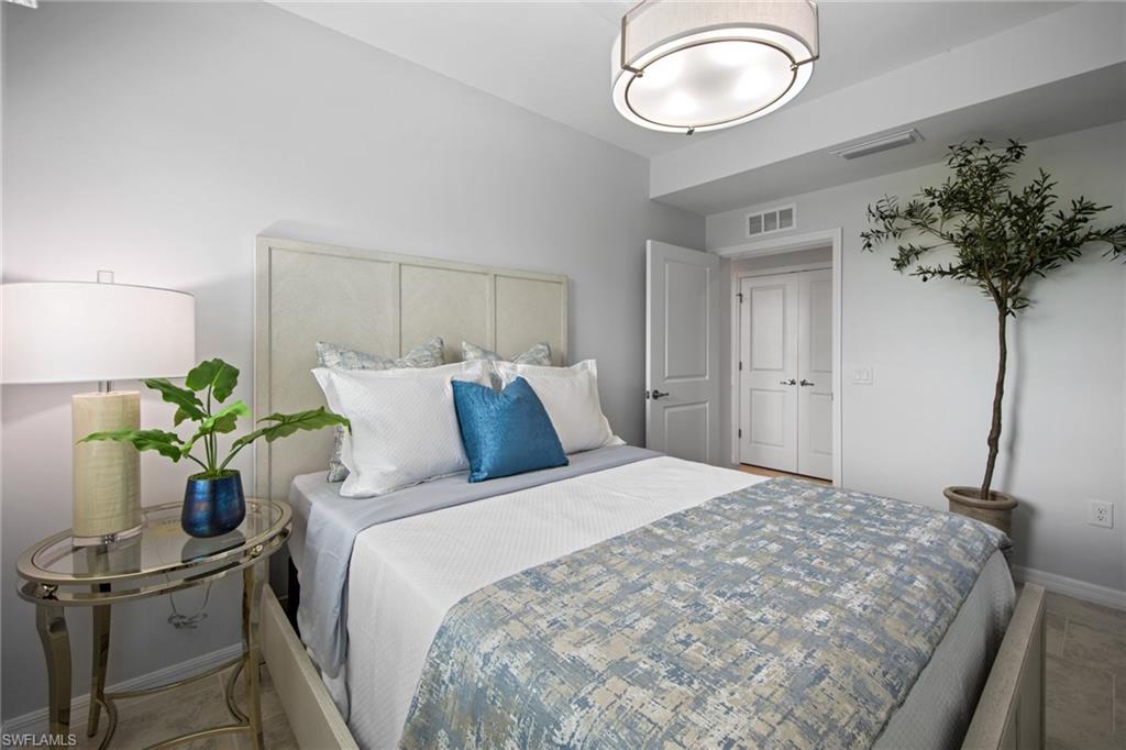 6008 Ellerston Way Avenue, Unit 1011 Immokalee, FL 34142 - Photo 29 of 50 Bedroom featuring baseboards