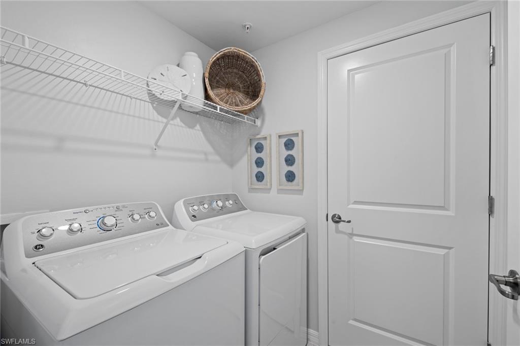 6008 Ellerston Way Avenue, Unit 1011 Immokalee, FL 34142 - Photo 32 of 50 Washroom featuring separate washer and dryer