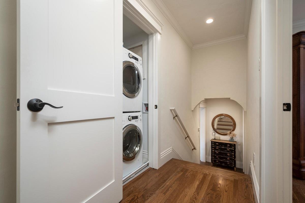 216 Victoria Road Burlingame, CA 94010 - Photo 12 of 28 a view of storage and utility room with washer and dryer