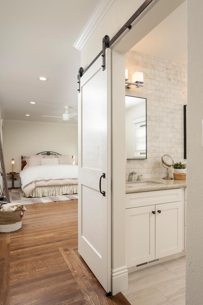 216 Victoria Road Burlingame, CA 94010 - Photo 14 of 28 a en suite bathroom with a shower sink and mirror