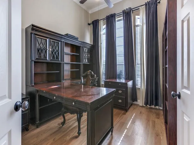 a room with a table and a window