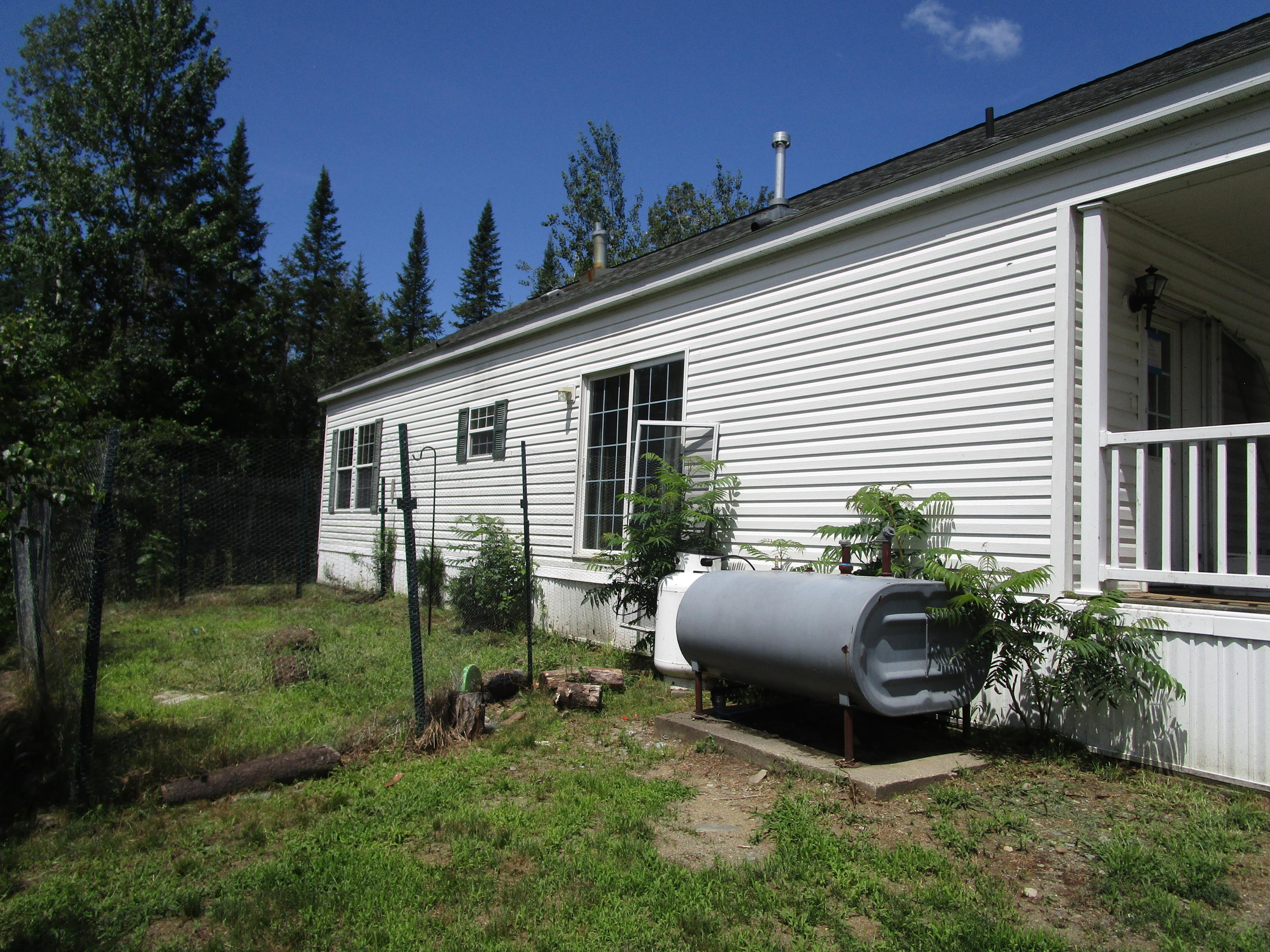 621 County Road Milford, ME 04461 - Photo 5 of 18 Exterior Back View
