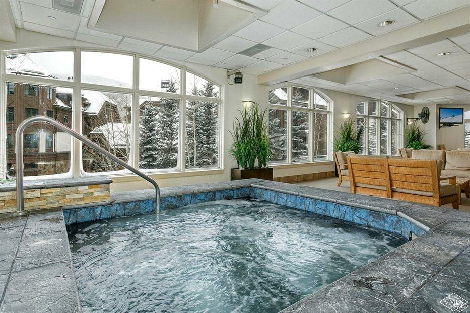 210 Offerson Road, Unit 308WEEK 51 Beaver Creek, CO 81620 - Photo 19 of 20 a living room with large windows