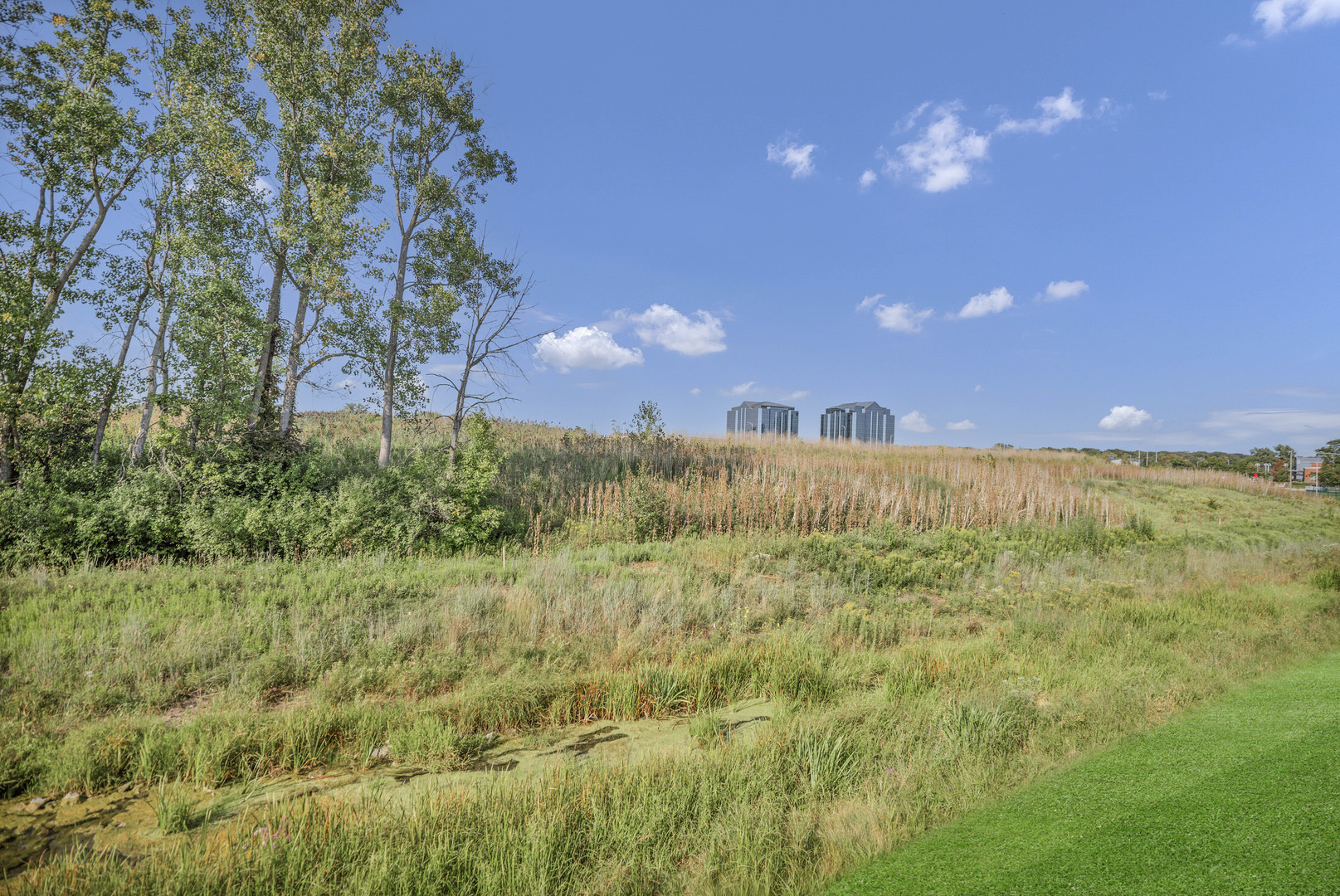 70 Prairie Court Wheeling, IL 60090 - Photo 11 of 44 a view of a yard and an ocean view