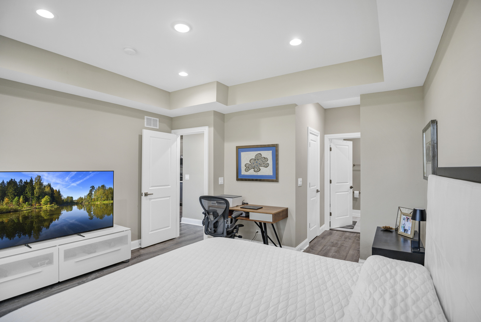 70 Prairie Court Wheeling, IL 60090 - Photo 14 of 44 a bedroom with a bed and a flat screen tv
