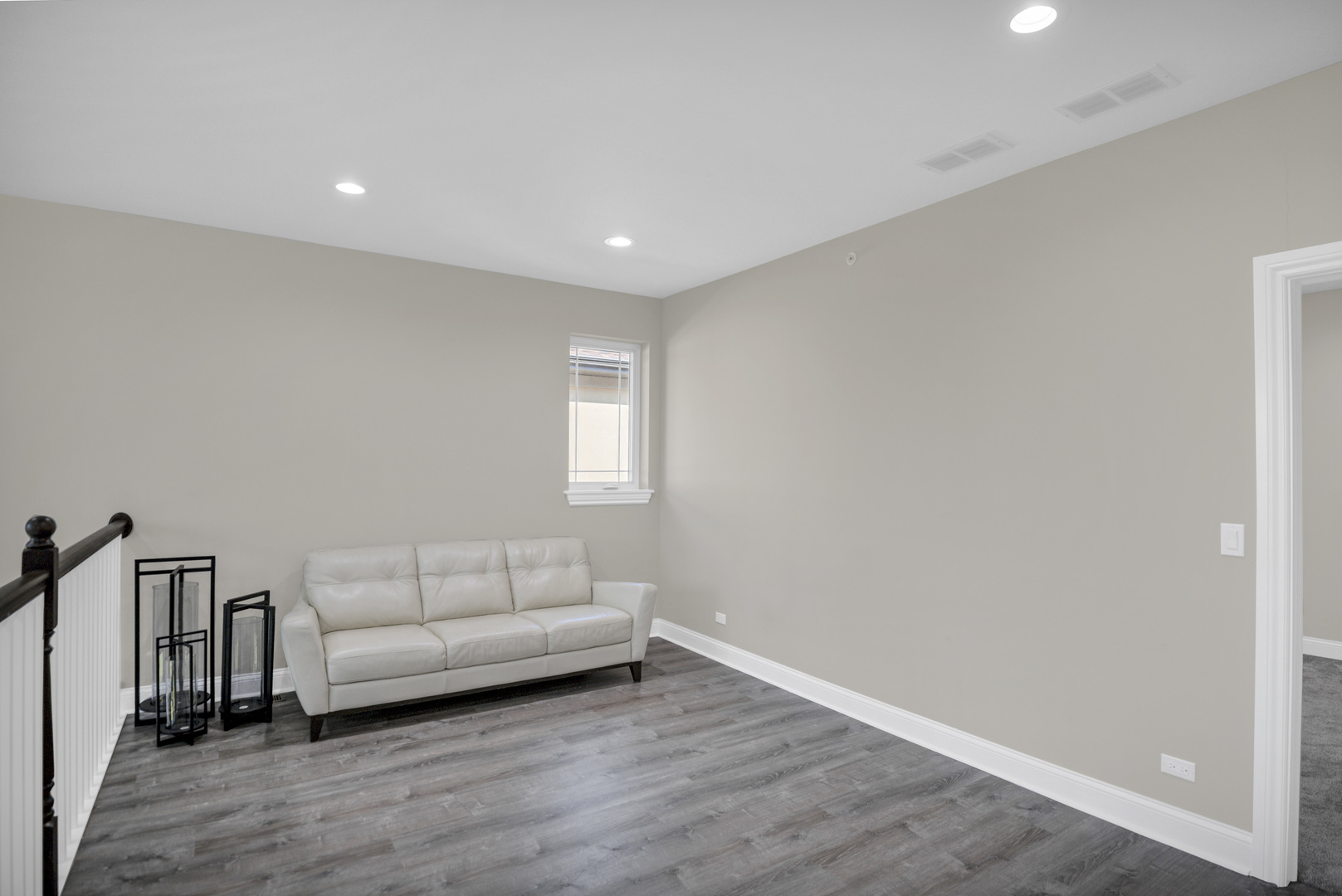 70 Prairie Court Wheeling, IL 60090 - Photo 28 of 44 a living room with furniture and a wooden floor
