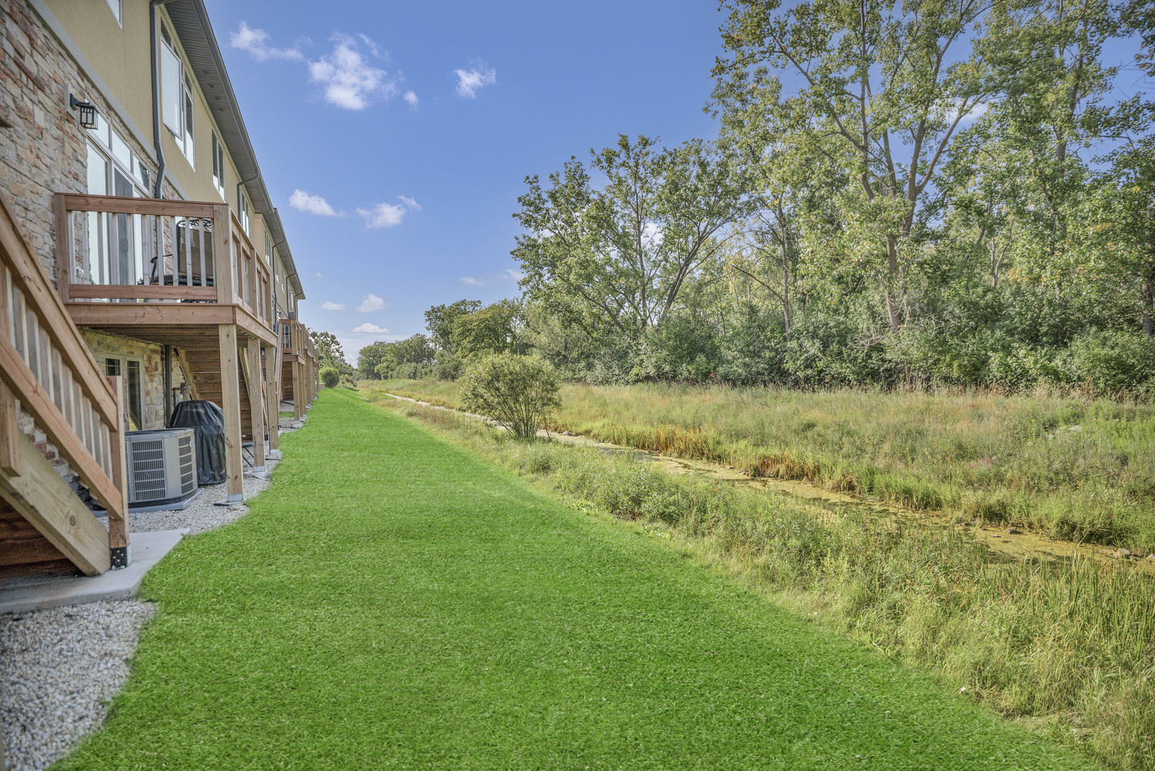 70 Prairie Court Wheeling, IL 60090 - Photo 3 of 44 a view of an house with backyard and garden