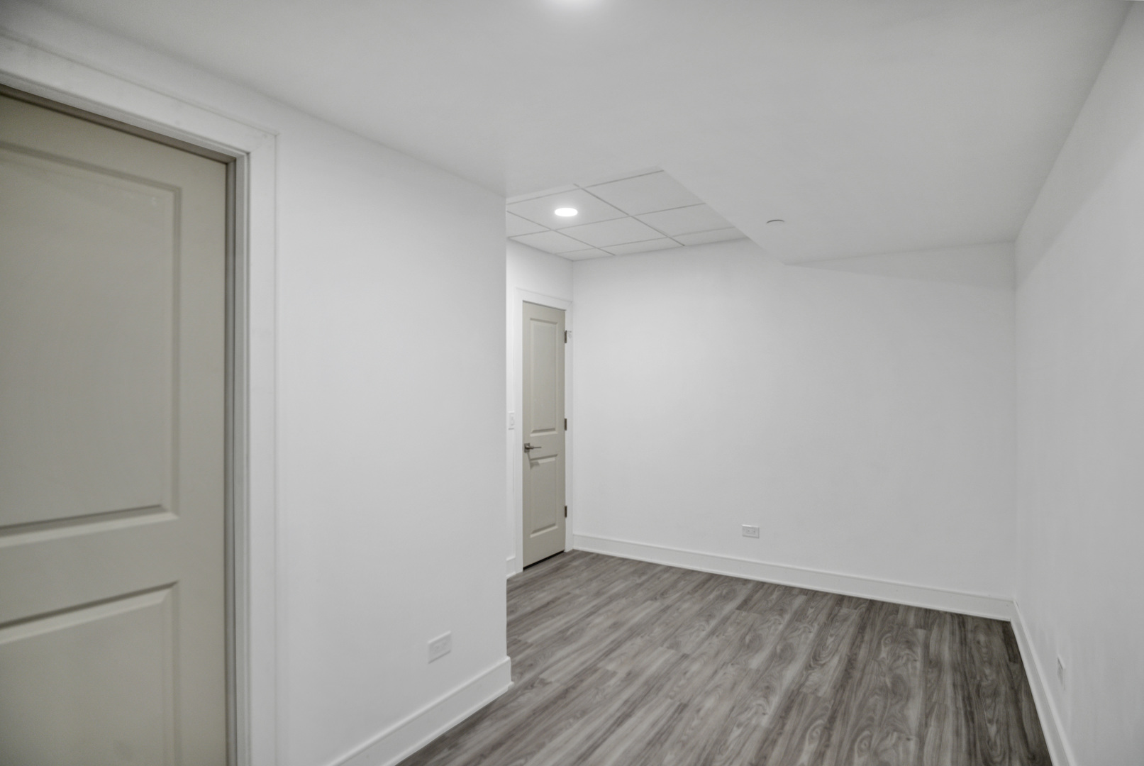 70 Prairie Court Wheeling, IL 60090 - Photo 33 of 44 a view of a room with wooden floor