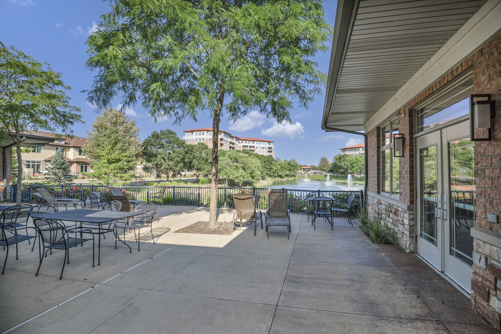70 Prairie Court Wheeling, IL 60090 - Photo 44 of 44 a view of a patio with a table and chairs