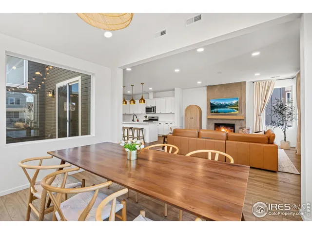 a view of a living room and dining room