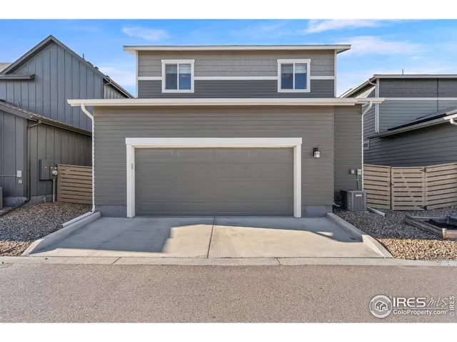a black and white photo of a house