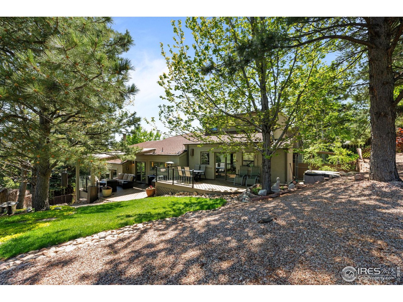3945 Promontory Court Boulder, CO 80304 - Photo 2 of 33 a view of a park with large trees