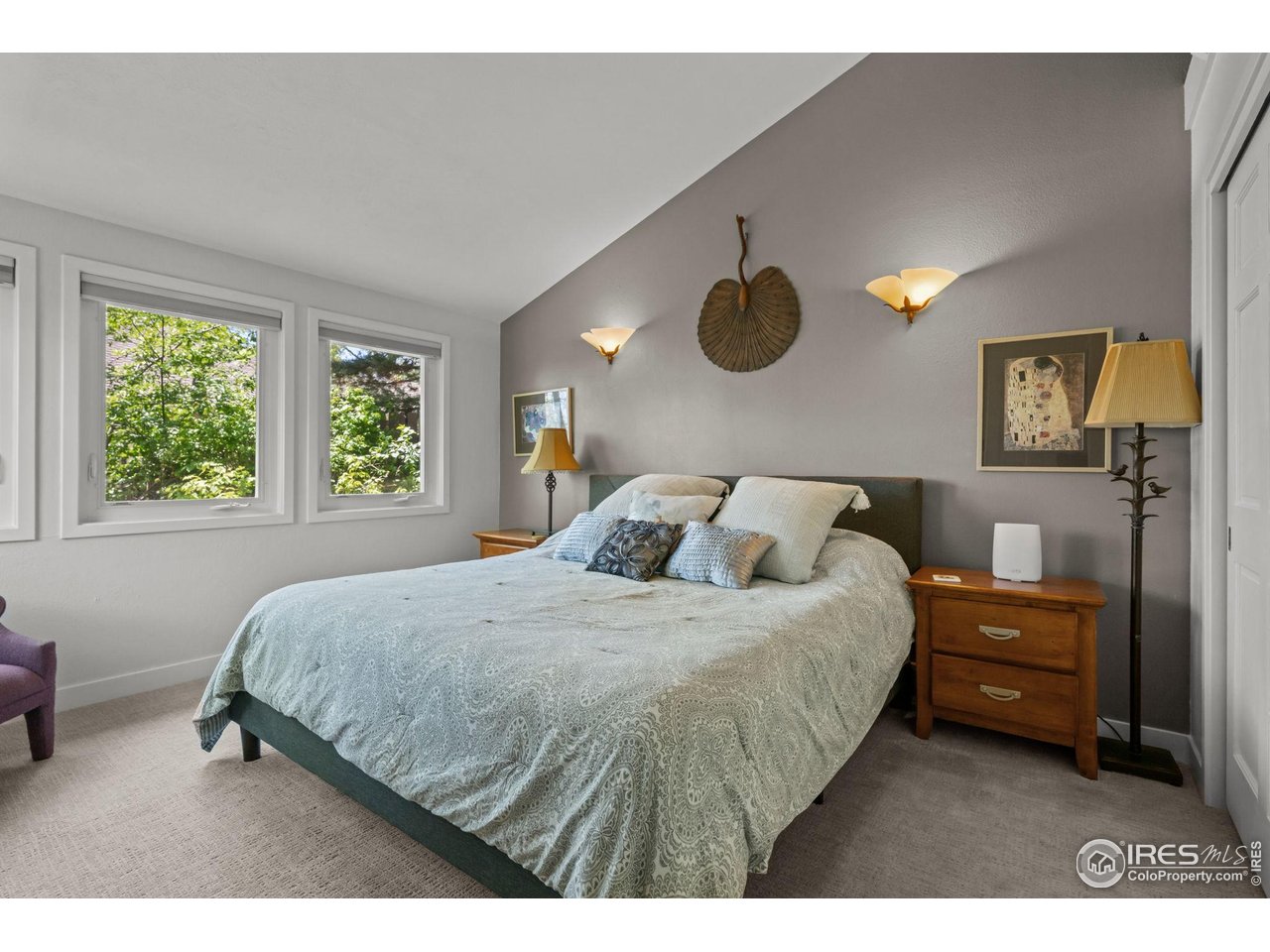 3945 Promontory Court Boulder, CO 80304 - Photo 26 of 33 a bedroom with a bed and window