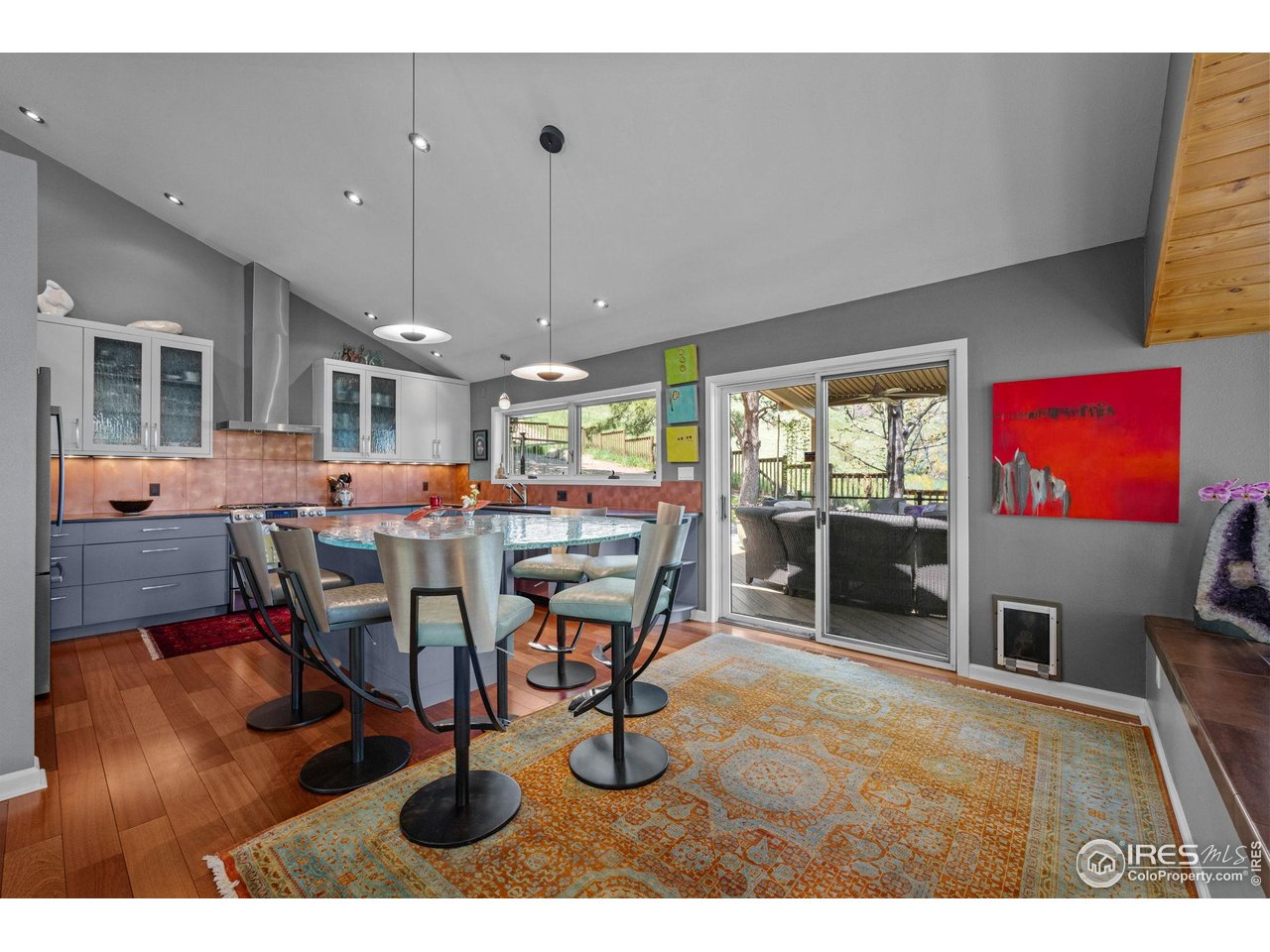3945 Promontory Court Boulder, CO 80304 - Photo 10 of 33 a view of a dining room with furniture window and outside view