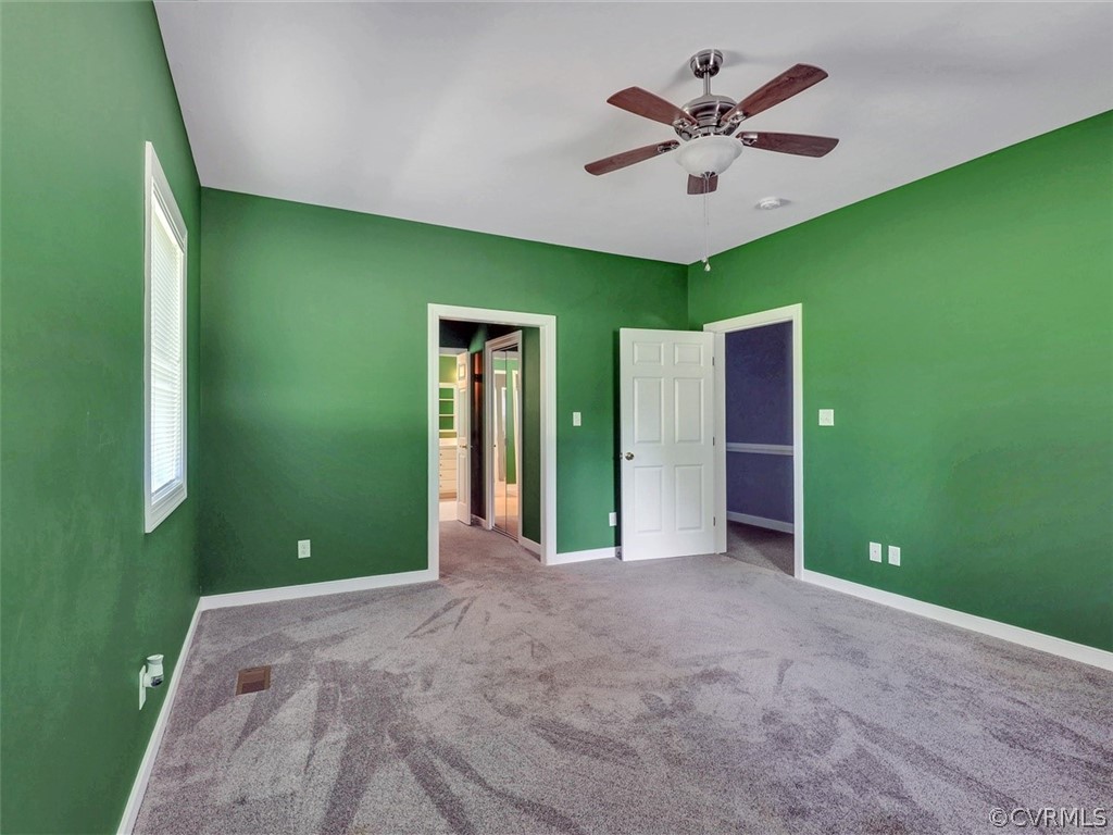 11311 Bundle Road Chesterfield, VA 23838 - Photo 16 of 38 a view of an empty room with a ceiling fan and window