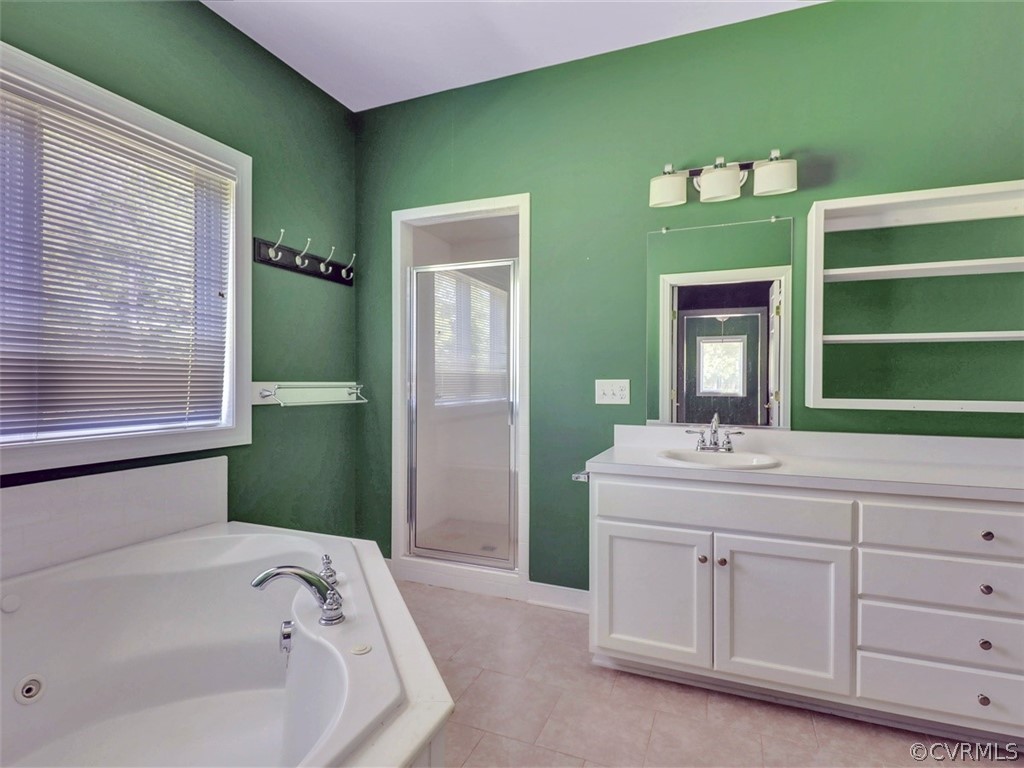 11311 Bundle Road Chesterfield, VA 23838 - Photo 17 of 38 a bathroom with a sink and bathtub
