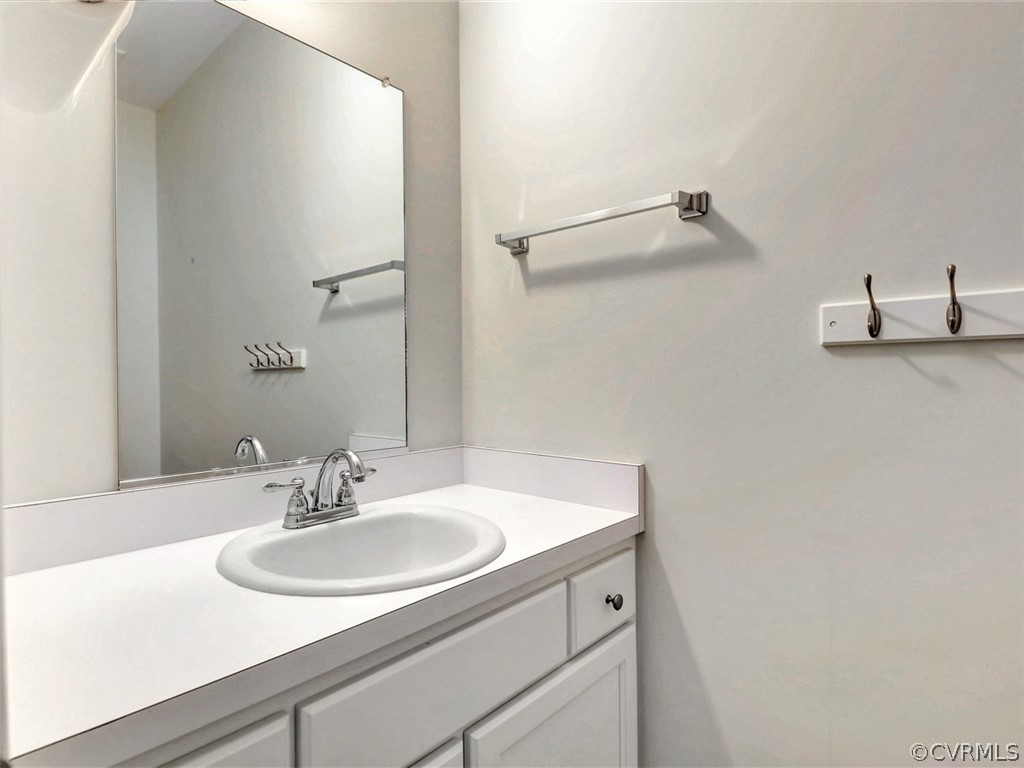 11311 Bundle Road Chesterfield, VA 23838 - Photo 20 of 38 a bathroom with a sink and a mirror