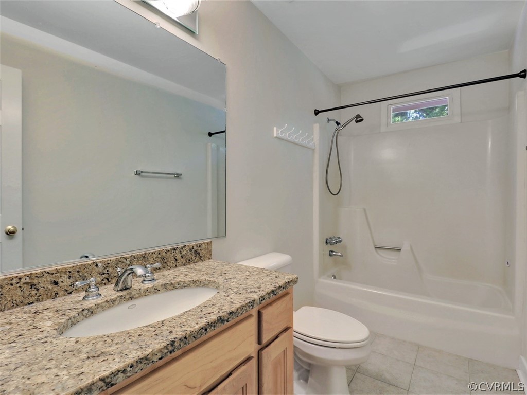 11311 Bundle Road Chesterfield, VA 23838 - Photo 27 of 38 a bathroom with a granite countertop sink toilet and shower