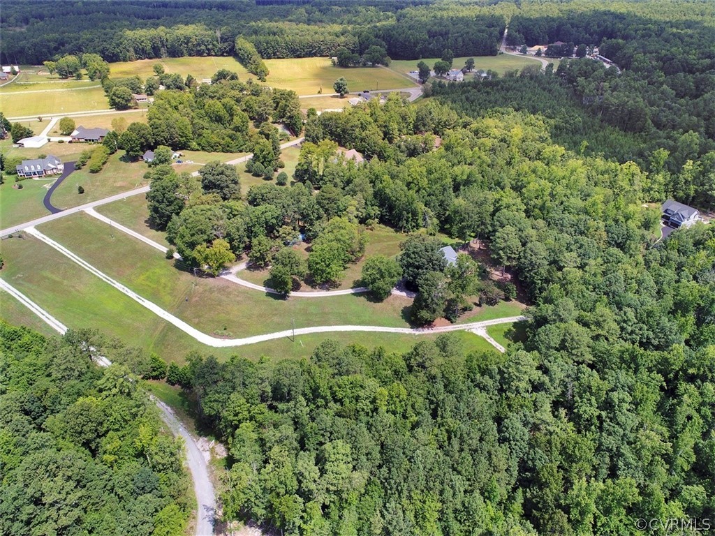 11311 Bundle Road Chesterfield, VA 23838 - Photo 3 of 38 a view of a lush green field