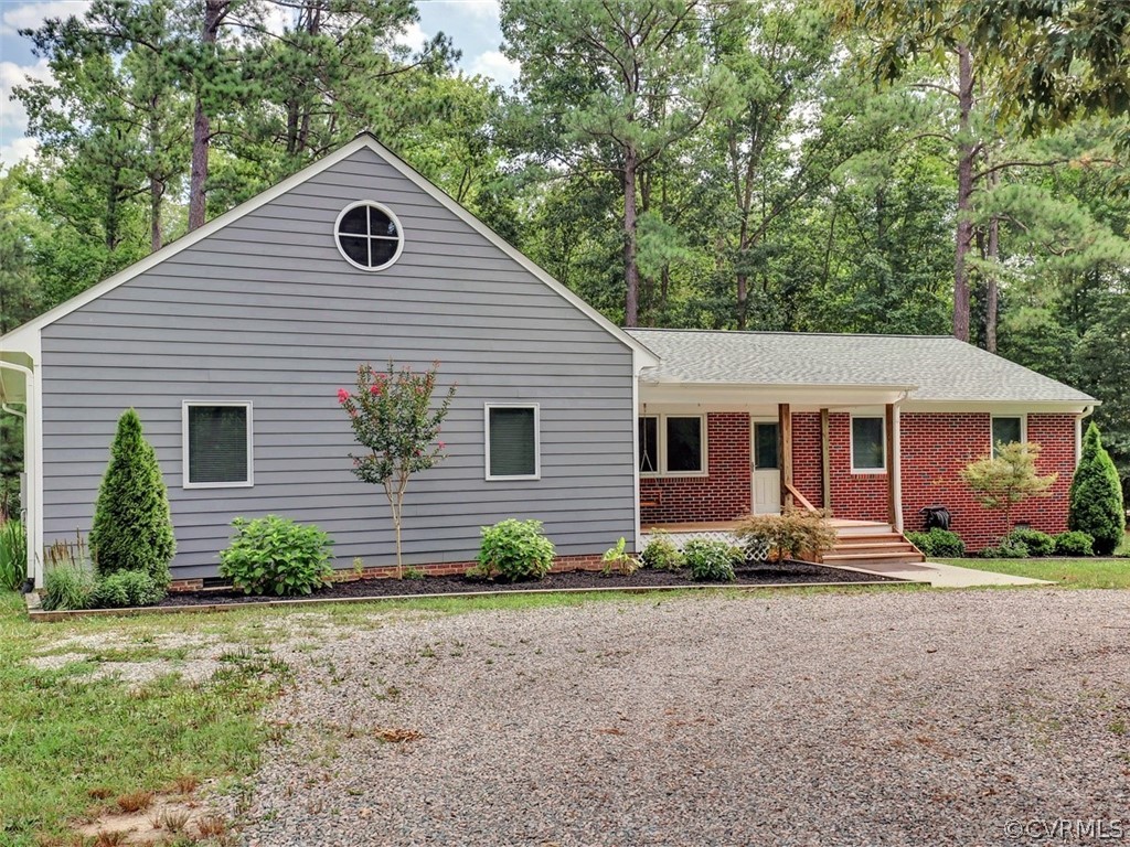 11311 Bundle Road Chesterfield, VA 23838 - Photo 5 of 38 a front view of a house with garden