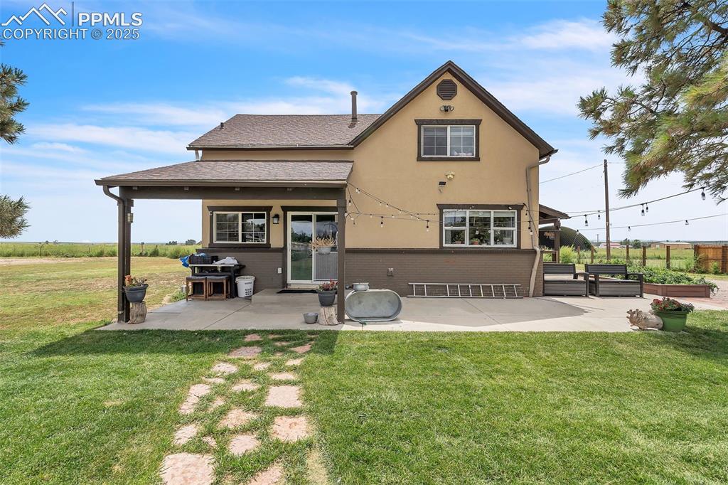 7865 Wilson Road Fountain, CO 80817 - Photo 3 of 46 a front view of a house with patio