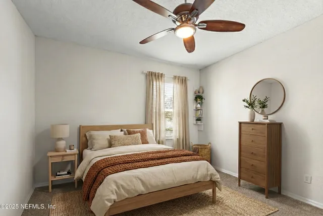 a view of a hallway with wooden floor and entryway