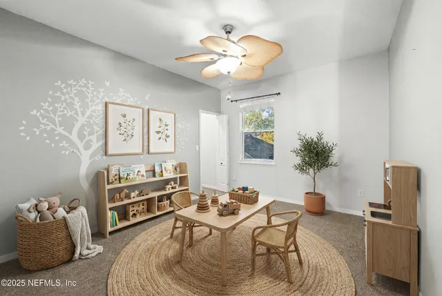 a bathroom with a toilet a sink and a mirror